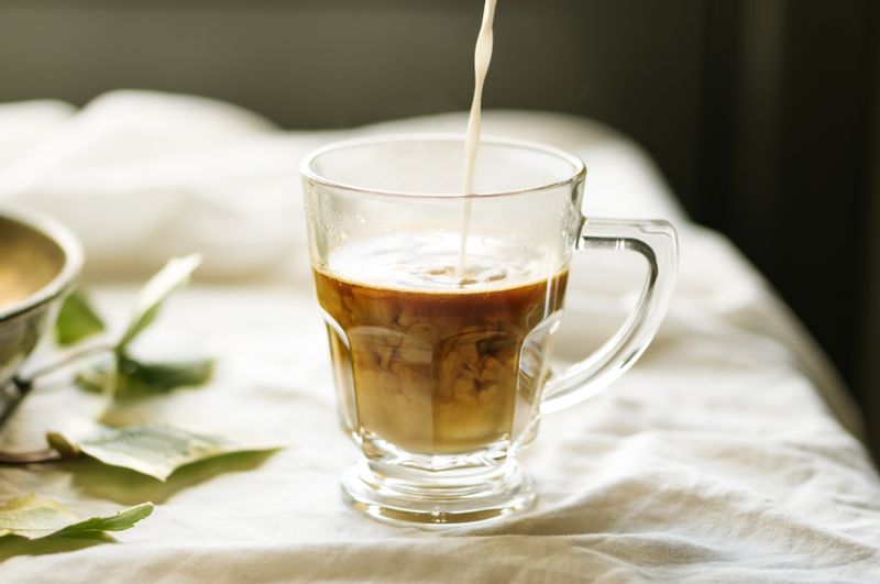 Cold brew coffee with cream served in a glass